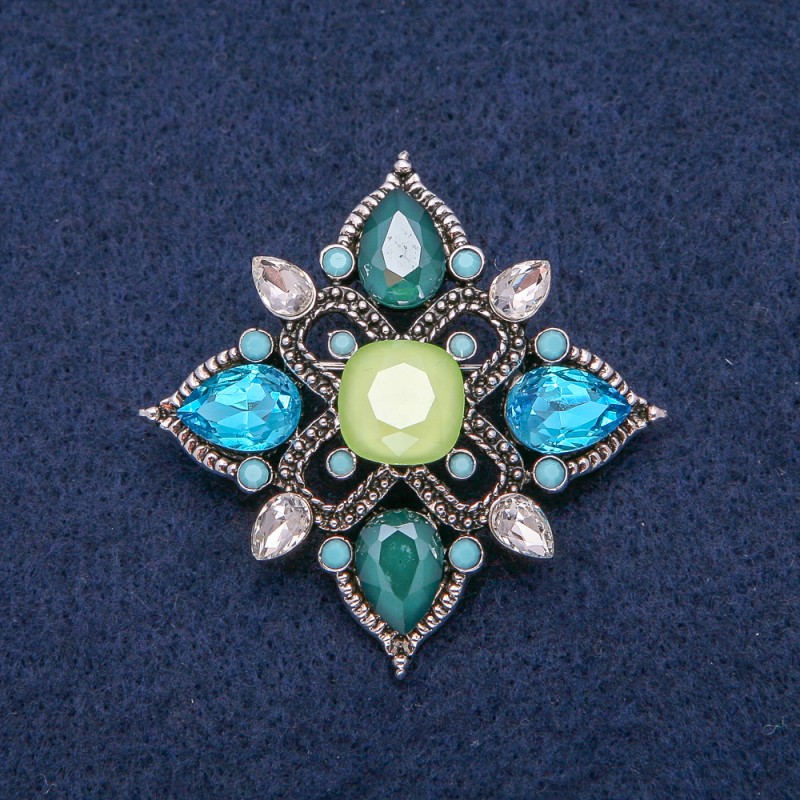 Brosche Blume aus silberfarbenem Metall mit Strasssteinen, 44 × 44 mm