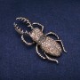 Brosche Maikäfer mit Strasssteinen, goldfarbenes Metall, 36 × 78 mm