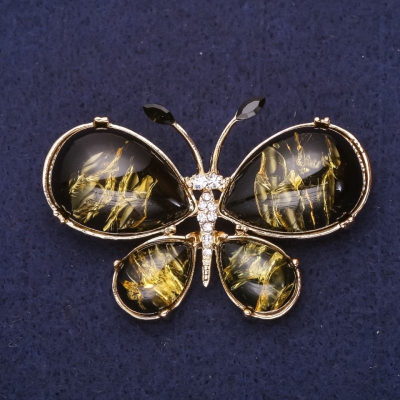 Brosche Schmetterling, weiße Strasssteine, Bernstein (künstlich) 56 × 36 mm, Gelbmetall