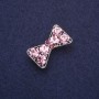 Brosche 'Schleife' mit lilafarbenen Strasssteinen, 27×16 mm, silberfarbenes Metall