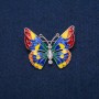 Brosche Schmetterling mit weißen Kristallen und bunter Emaille, goldfarbenes Metall 31 × 37 mm