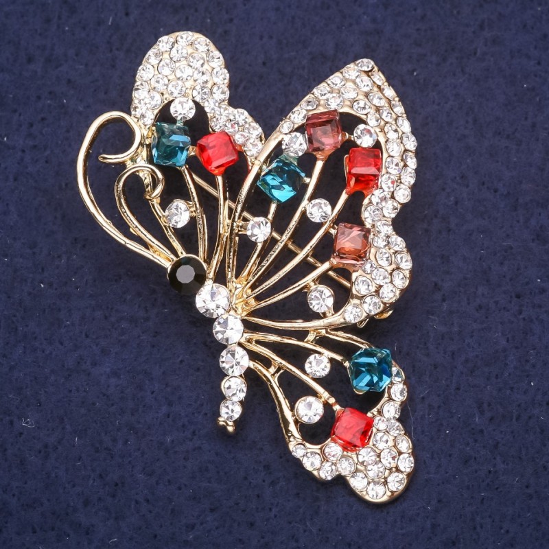 Brosche Schmetterling mit roten, blauen und burgunderfarbenen Steinen, 60×40 mm, aus gelbem Metall