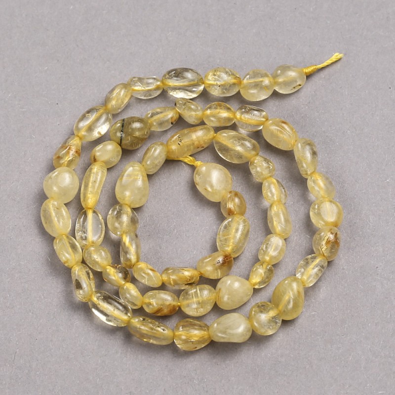 Perlen auf einer Schnur aus Naturstein Rutilquarz facettiert, Durchmesser ca. 8 × 6 mm, Länge ca. 39 cm
