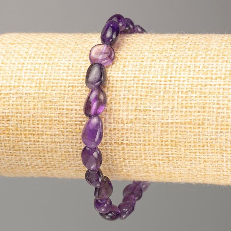 Armband aus Naturamethyst, facettiert, Elastikarmband, Umfang 18 cm, Perlenmaß 9×6 mm +