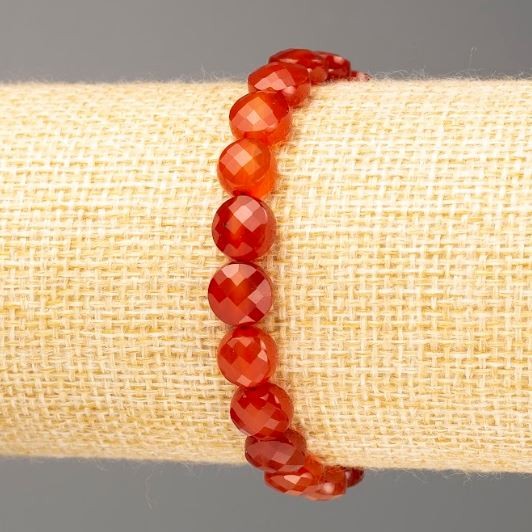 Armband aus Karneol, facettierte Münzperlen, Durchmesser 8×5 mm ±, Länge 18 cm (Stretch)