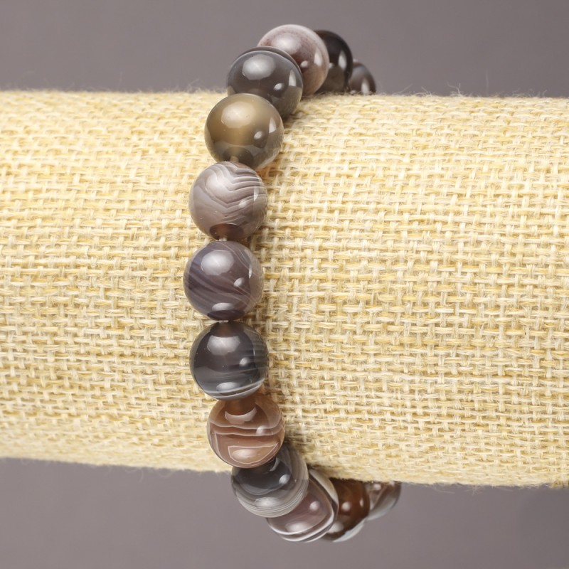 Elastisches Armband aus Botswanaachat mit einer glatten Kugel, Durchmesser ca. 10 mm