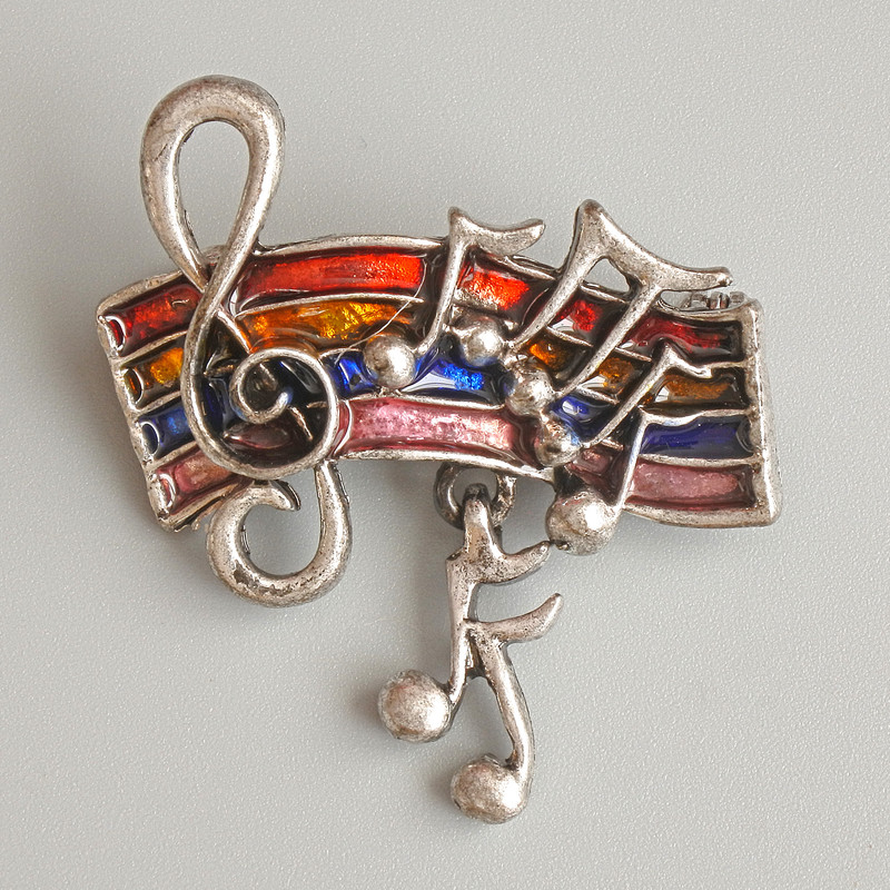 Brosche »Noten«, mehrfarbige Emaille, silberfarbenes Metall, 33×26 mm