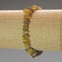 Armband aus Grossular (grüner Granat) Natursteinstücke, Durchmesser ca. 7 x 3 mm, Länge 18 cm (Stretch)